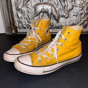 Yellow high top converse